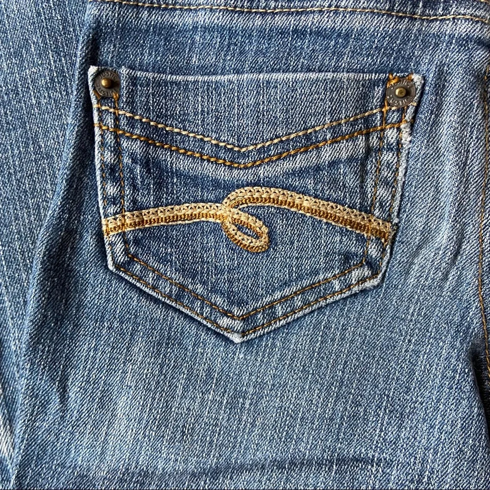 Justice Jeans 7R Simply Low boot cut blue Jeans. No stains or holes. Medium blue